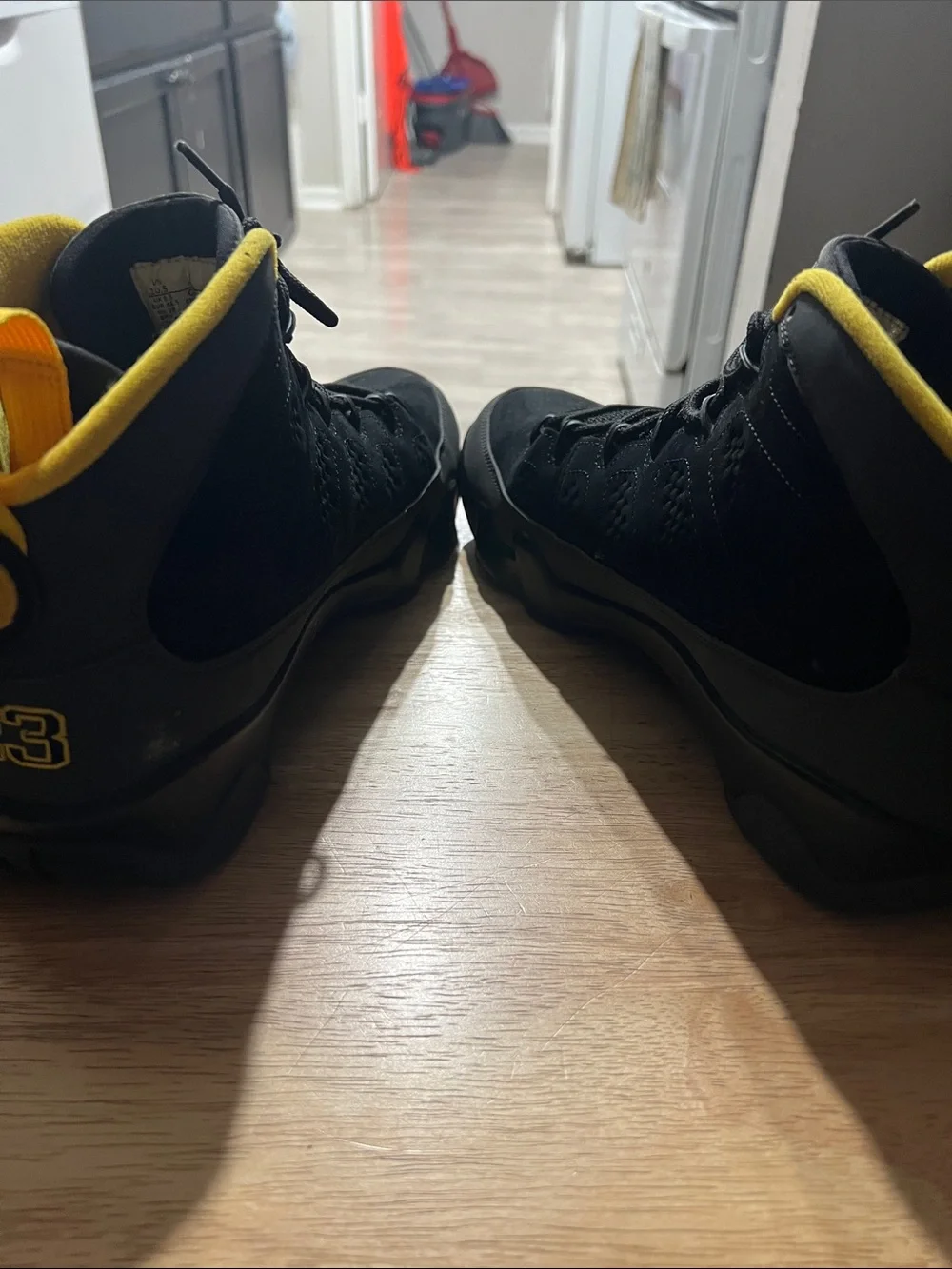 Jordan Black High-Top Sneakers with Yellow Trim
